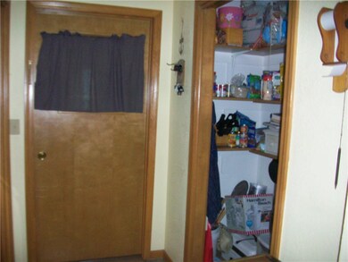 Pantry off kitchen and door to mudroom/garage