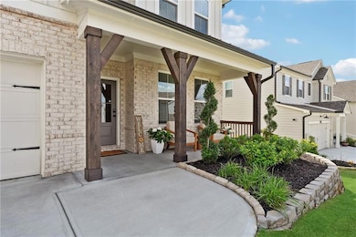 Property entrance featuring a porch