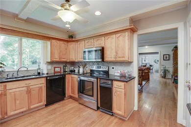 Custom Kitchen cabinets, granite, real wood floori
