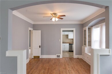 Spacious Din area with Window Bench, Built in Cabinets/Storage, Leads into the Updated Kitchen w/ Back & Side Dr. The Dr on Left leads to the Full Bth & 2 Bdrms.