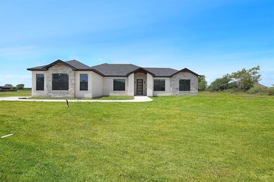 View of front of property featuring brick siding, 