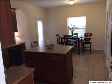 LARGE OPEN KITCHEN WITH BREAKFAST BAR, AND BIG EAT