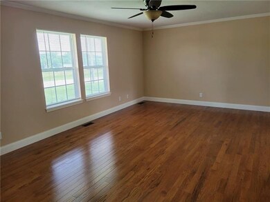 Brand new oak floor in living room. Crown molding 