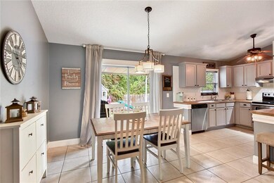 Nice eat-in kitchen is functional and has access to outdoor grill area