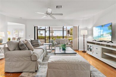Living room featuring light hardwood / wood-style