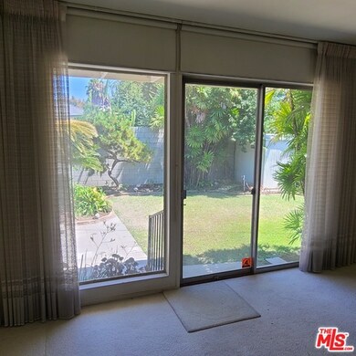 Bright, spacious Livingroom opens to scenic backya