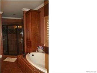 Jetted garden tub, tiled 6x6 shower with double sh