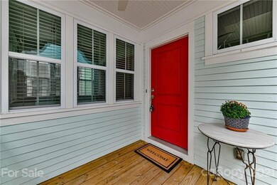 Charming, cottage style house with a cute, covered