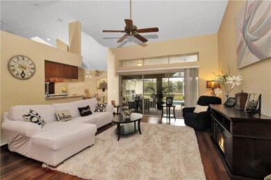 Spacious great room with sliders out to pool and l