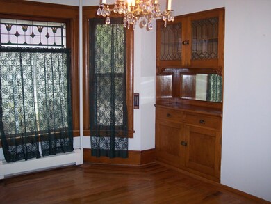 dining room with stained glass windows<|