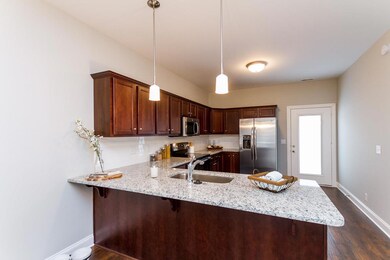Kitchen with Granite, No Tile Backsplash Full Stainless Steel Appliance Package