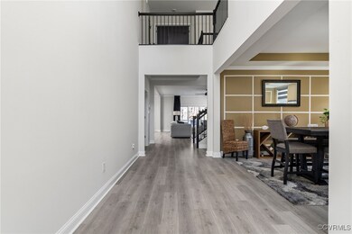 Hall featuring light wood-type flooring