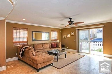 Great Room  with stunning 18? Travertine Tiles tri