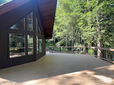East side of the cabin - with big front deck to take in the forest and mountain views...