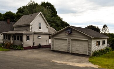 2. Another view of the front with paved