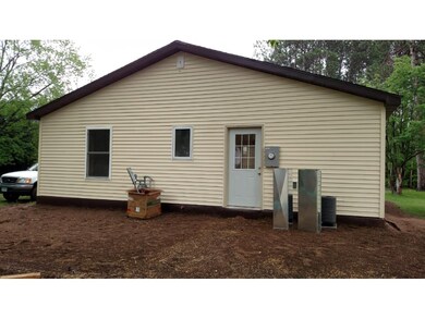 View of the back of home. Will have sidewalk to ga
