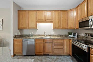 Another view of the kitchen showing the abundance of cabinetry.