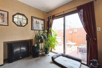 living room w/ electric firepalce