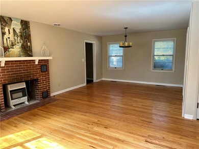 Living room and dining area. Home faces south with
