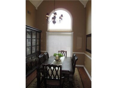 Elegant Dining Room with gorgeous windows and lots