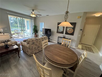 Living room featuring ceiling fan