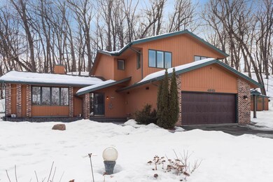 Nestled on a full acre, with mature tress and land