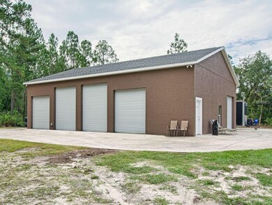 THIS GARAGE IS FANTASTIC!  ROLL UP DOORS, LOFT ARE