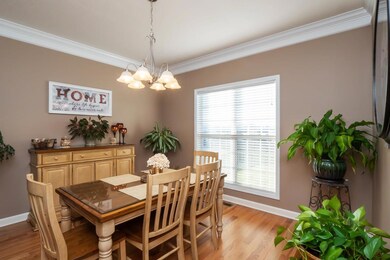 Separate dining room with newly installed hardwood floors.