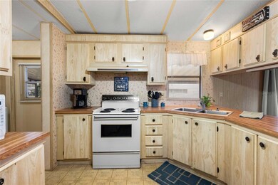 Kitchen has loads of cabinets