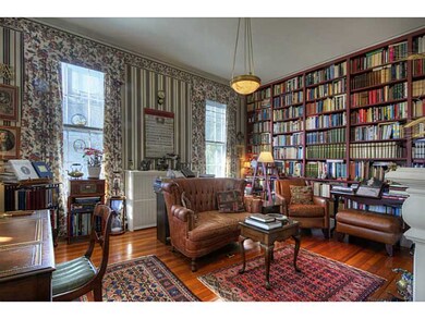 Other. Library with built-in book shelves and fire