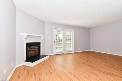 Living Room with wood burning fireplace.