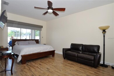 Expansive master bedroom with brand new wood tile 