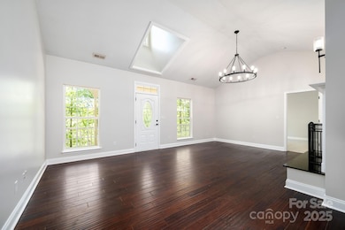 Tall Ceilings, Large Windows and Skylight Provide Ample Natural Light