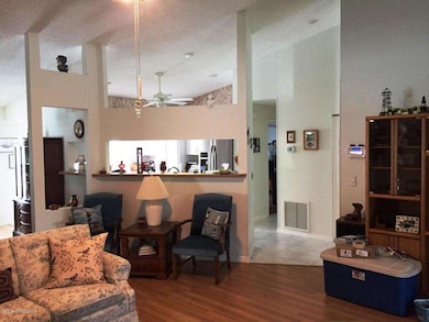 7. Living Room to Kitchen