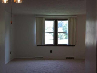Living Room Living Room features newer carpeting a