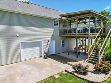 BACK PORCH/ DOWNSTAIRS SHOP GARAGE