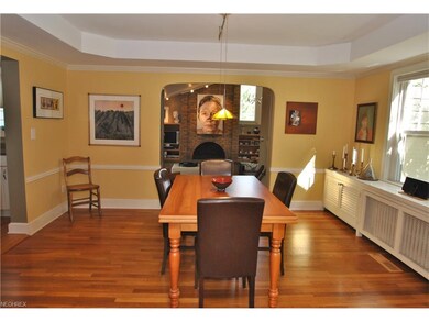 The tray ceiling adds height to the dining area.