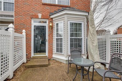 Enjoy the patio in this beautiful neighborhood. 