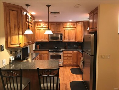 Breakfast bar, 42 inch cabinets, built in microwav