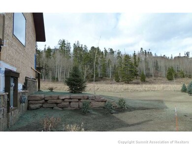 Exterior Front. Big, open lot nestled in the aspen
