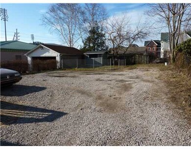Other. Back of home/parking