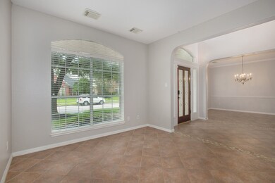 The formal living room could easily be a downstairs playroom, yoga studio or a home office!