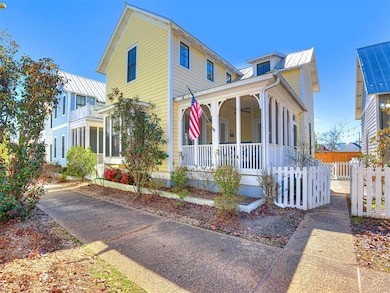 View of front of house featuring a sunroom