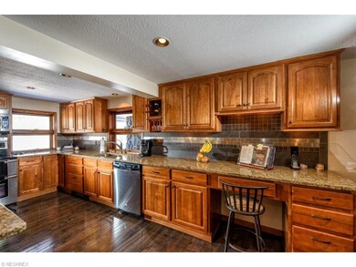 Beautifully remodeled kitchen with granite counter