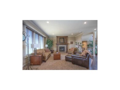Simulated Photo. Great Room w/ gas fireplace & car
