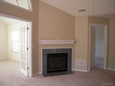 Fresh Neutral Paint in Living area. Gas Fireplace