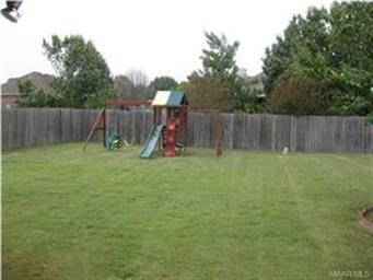 The backyard is huge, private and has lots of room