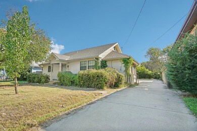 View of property exterior with a lawn