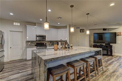 Kitchen featuring appliances with stainless steel