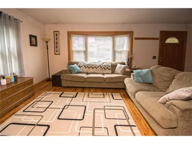 Living room opens up to dinette and kitchen, givin